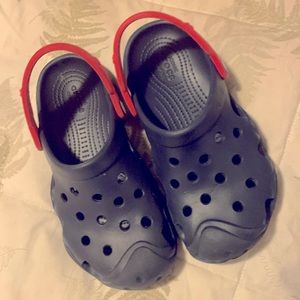 Crocs - Navy Blue w/Red Straps junior size 5/6 in good condition.  9 inches long